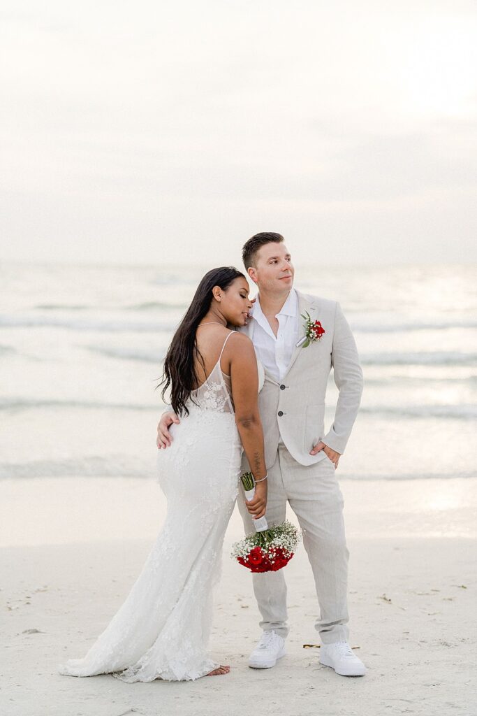 bride and groom at the beach 