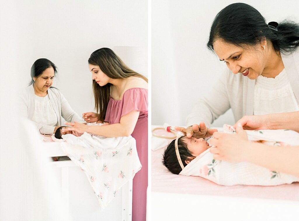 mom and daughter changing baby at In-Home Newborn Session