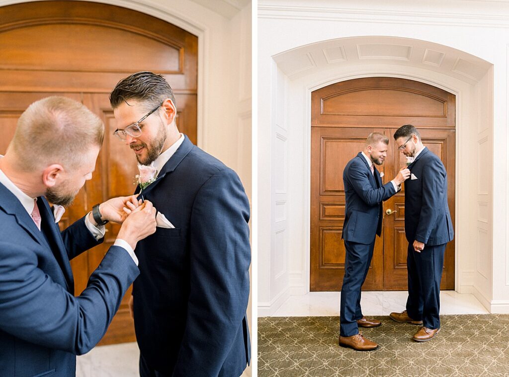 bestman putting on groom's boutonniere 