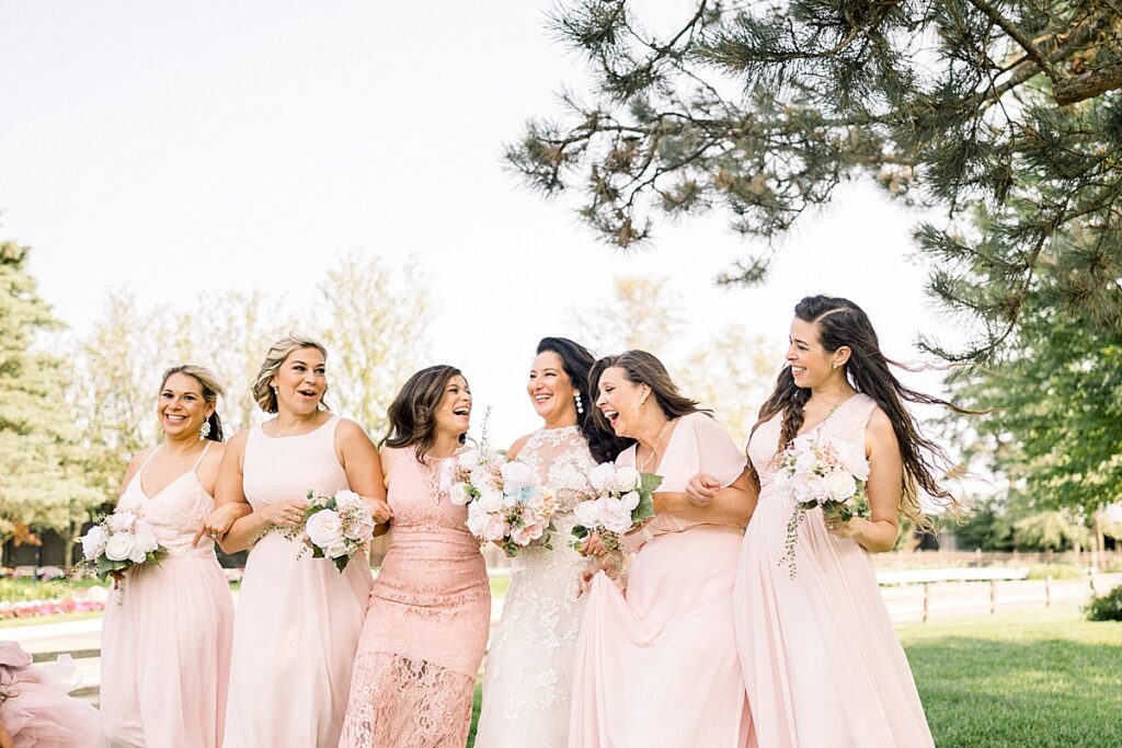 bride and bridesmaids at golf course pine lake country club